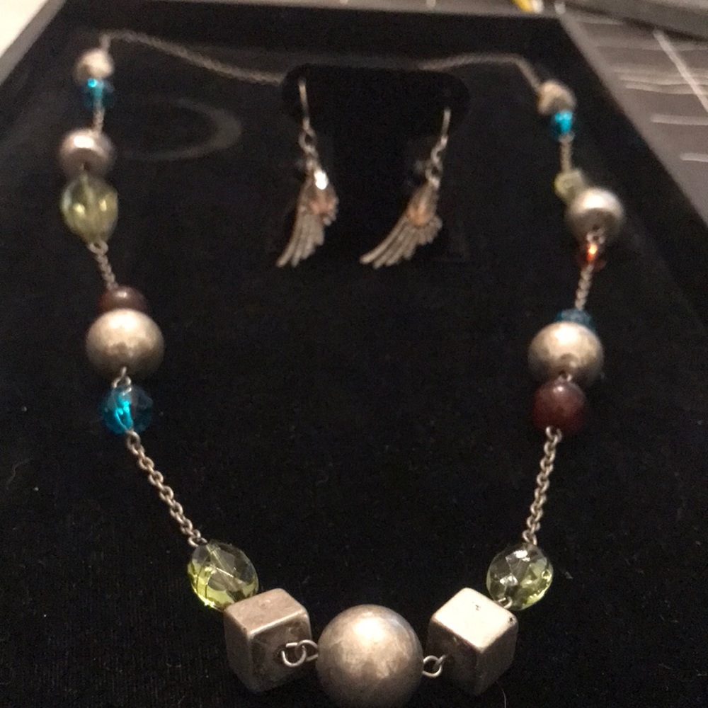 35” Multi color necklace with matching earrings.